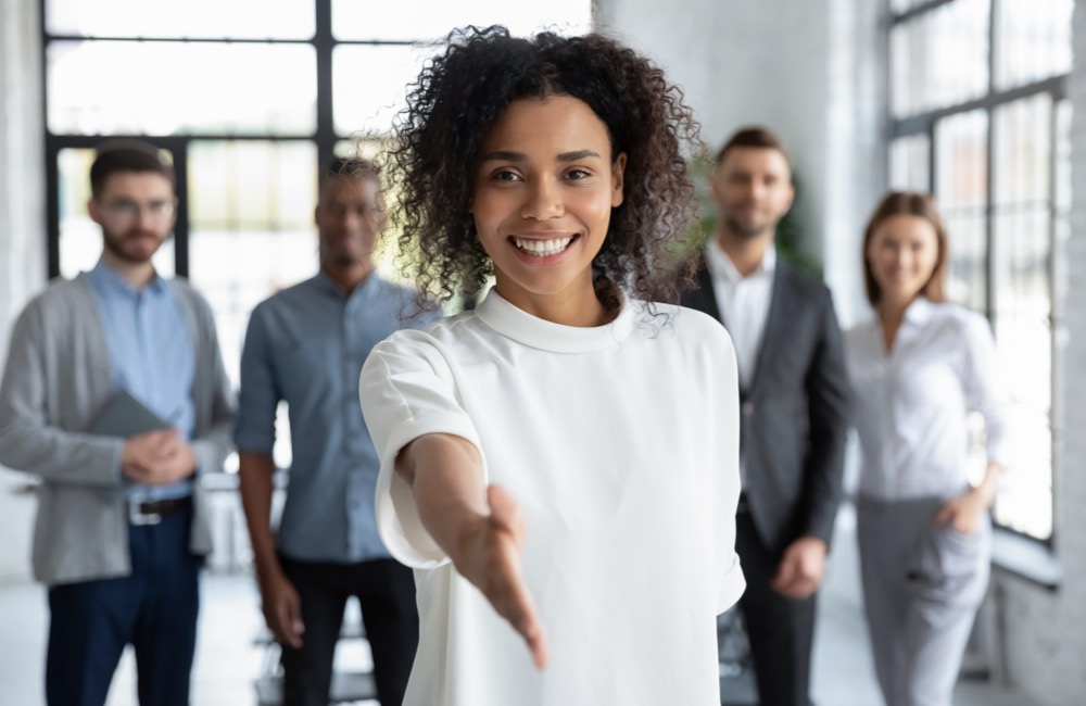 Careers - people coming to shake hands for introduction