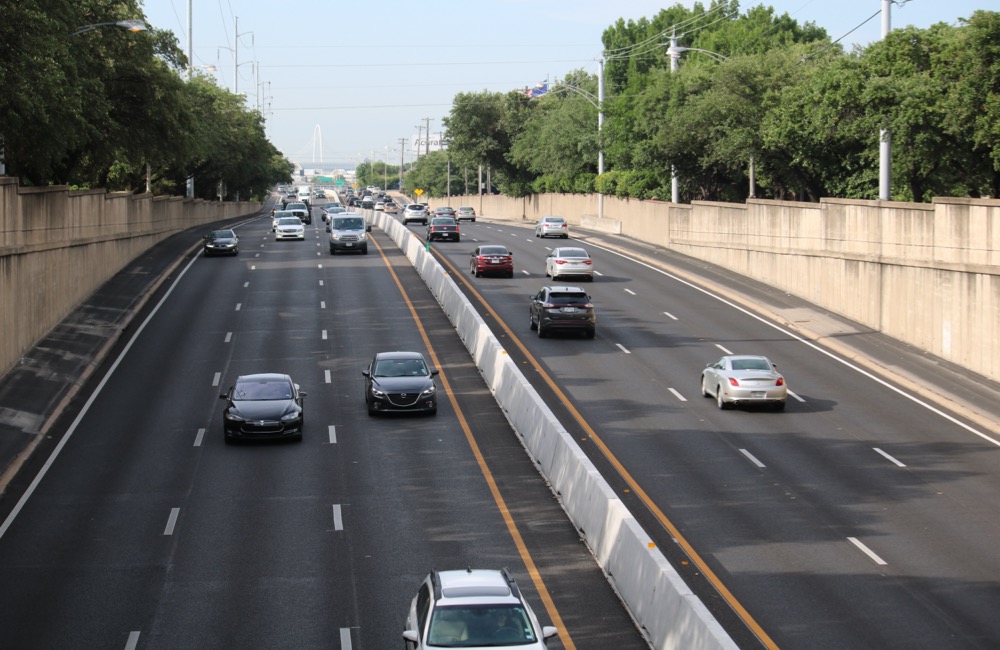 Overview & History - photo of cars passing both ways on highway from up high